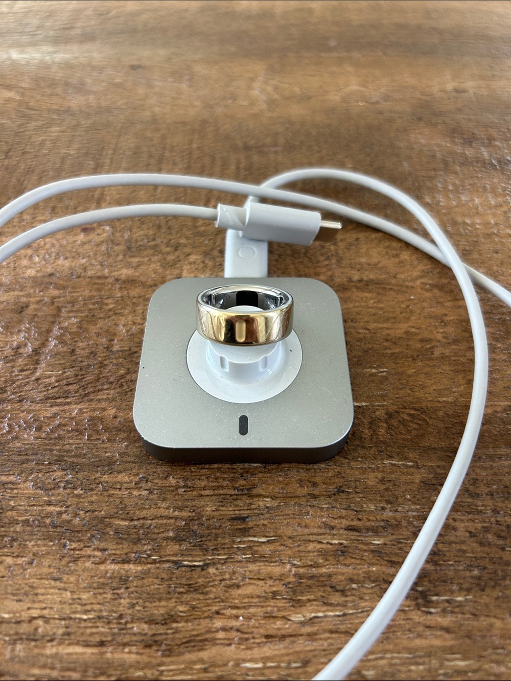 Oura Gold Ring 4 size 7 with charger